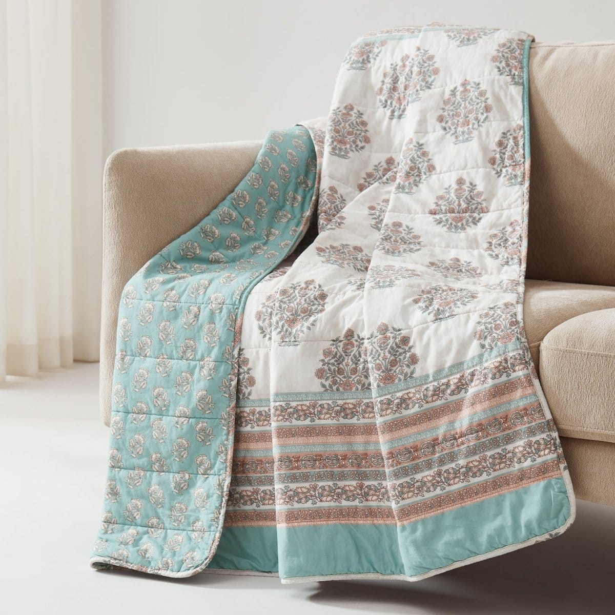 Reversible cotton throw with a floral block print